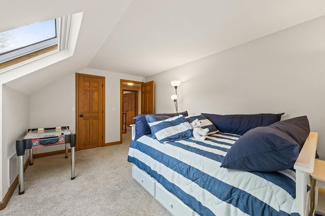 carpeted bedroom featuring lofted ceiling