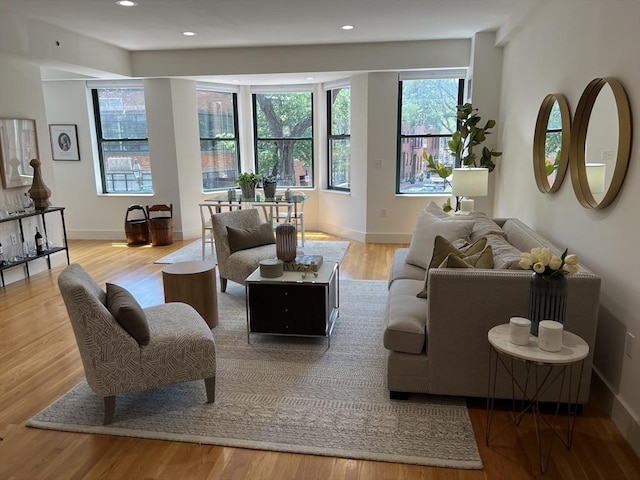 90 Broadway Unit 2C, Boston, MA 02116 - living area featuring light wood-style floors and recessed lighting