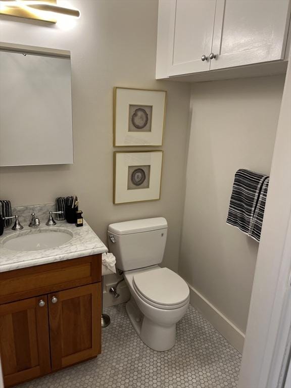 90 Broadway Unit 2C, Boston, MA 02116 - half bathroom with vanity and tile patterned flooring