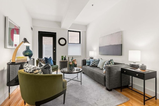 90 Broadway Unit 2C, Boston, MA 02116 - living room featuring wood finished floors and beam ceiling