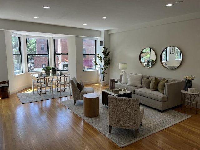 90 Broadway Unit 2C, Boston, MA 02116 - living room featuring wood finished floors and recessed lighting