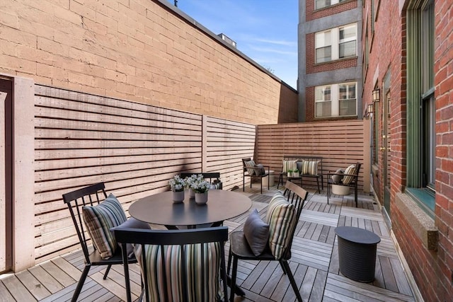 90 Broadway Unit 2C, Boston, MA 02116 - wooden terrace featuring an outdoor hangout area and outdoor dining area
