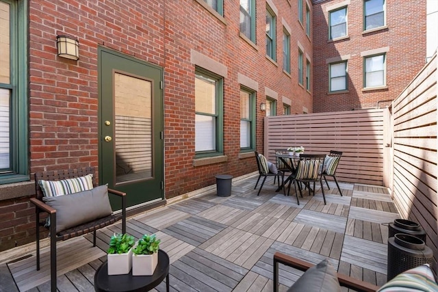90 Broadway Unit 2C, Boston, MA 02116 - wooden terrace featuring outdoor dining area