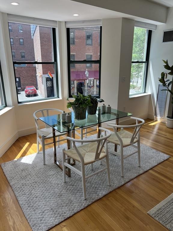 90 Broadway Unit 2C, Boston, MA 02116 - dining room featuring baseboards and wood finished floors