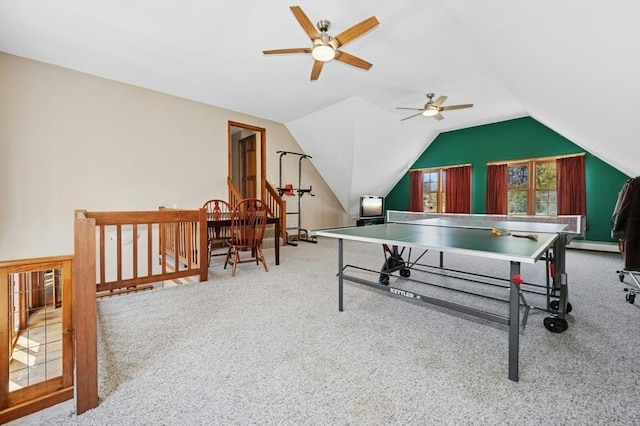 rec room featuring carpet floors, a ceiling fan, and lofted ceiling