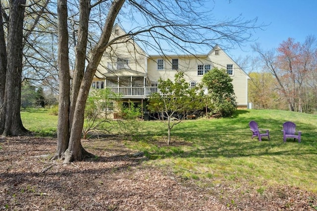 view of yard featuring a wooden deck
