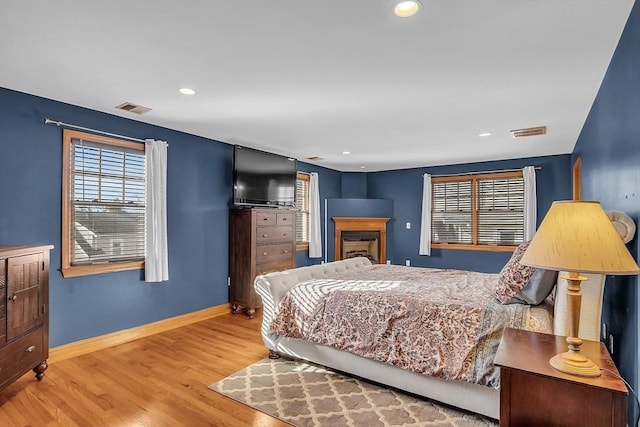 bedroom with light hardwood / wood-style flooring