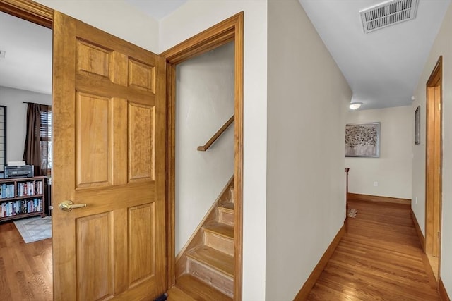 corridor featuring light hardwood / wood-style flooring