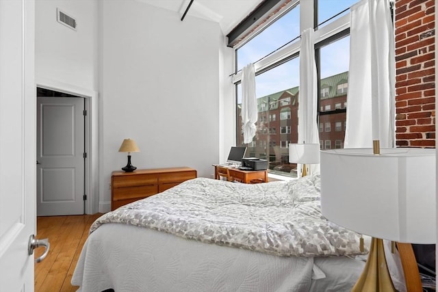 281 Essex St Unit 206, Salem, MA 01970 - bedroom with light wood finished floors and a high ceiling