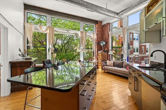 281 Essex St Unit 206, Salem, MA 01970 - sunroom featuring a sink and plenty of natural light