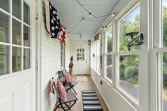 8 Holman St, Templeton, MA 01436 - sunroom / solarium featuring track lighting, plenty of natural light, and wood finished floors