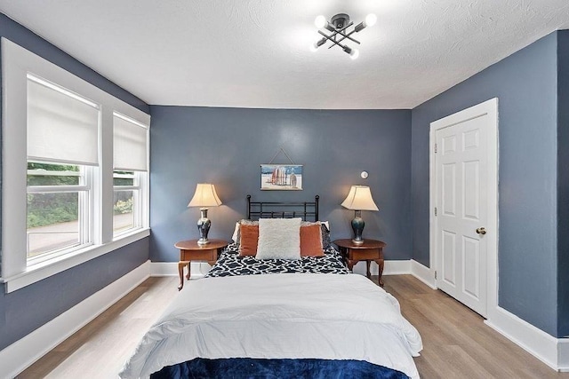 8 Holman St, Templeton, MA 01436 - bedroom featuring wood finished floors and baseboards