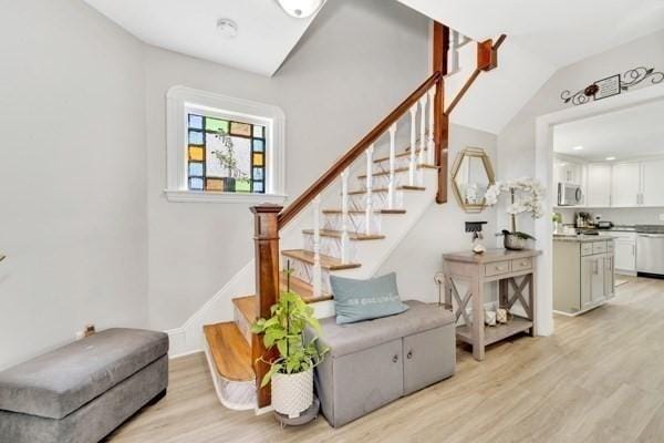135 Pine Grove Ave, Lynn, MA 01904 - stairway featuring wood finished floors and lofted ceiling