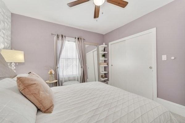 135 Pine Grove Ave, Lynn, MA 01904 - bedroom featuring a closet, a ceiling fan, and baseboards