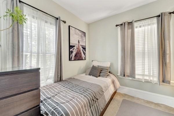 135 Pine Grove Ave, Lynn, MA 01904 - bedroom featuring multiple windows and carpet