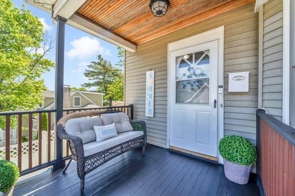 135 Pine Grove Ave, Lynn, MA 01904 - wooden deck featuring an outdoor hangout area