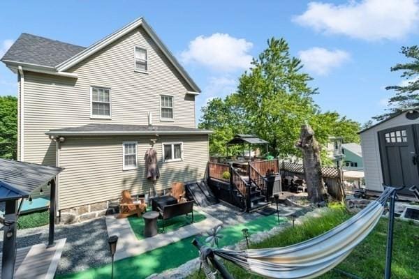 135 Pine Grove Ave, Lynn, MA 01904 - back of house featuring a patio