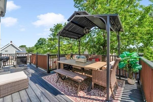 135 Pine Grove Ave, Lynn, MA 01904 - wooden terrace with outdoor dining space