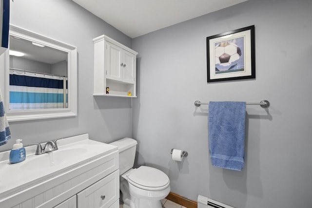 bathroom with toilet, baseboard heating, vanity, and baseboards