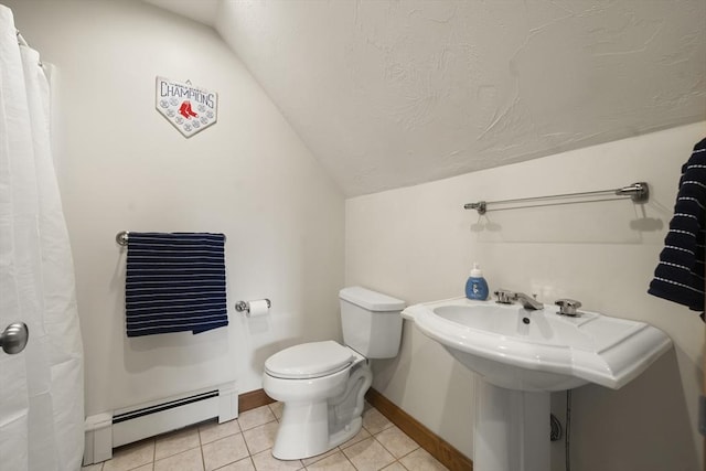 full bath with tile patterned flooring, a baseboard radiator, toilet, baseboards, and lofted ceiling