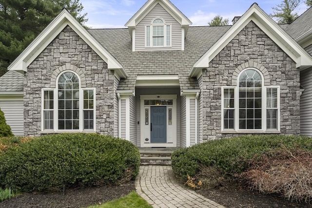 view of front facade featuring stone siding