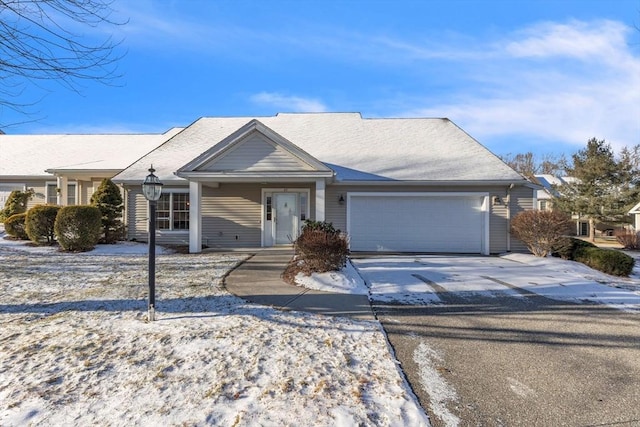 single story home featuring a garage