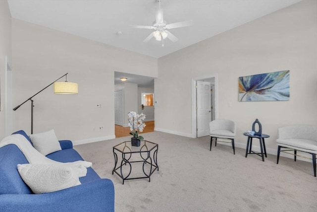 living room with carpet floors and ceiling fan