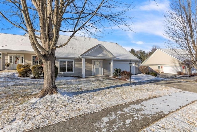 single story home featuring a garage