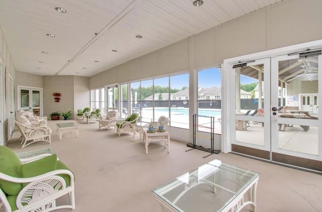 sunroom featuring french doors