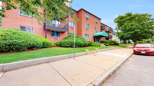 view of building exterior with a residential view