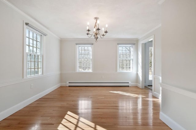 unfurnished dining area featuring a baseboard radiator, a chandelier, crown molding, and light wood finished floors