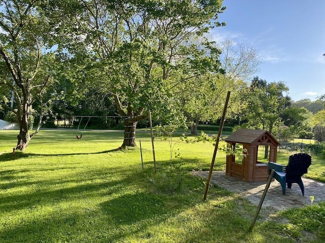 view of community with a yard