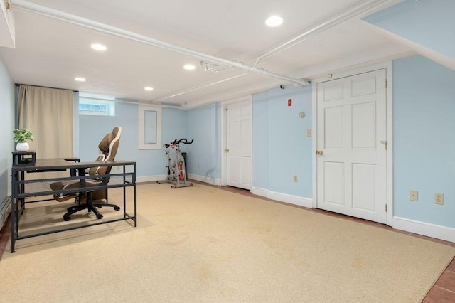 workout room with baseboards and recessed lighting