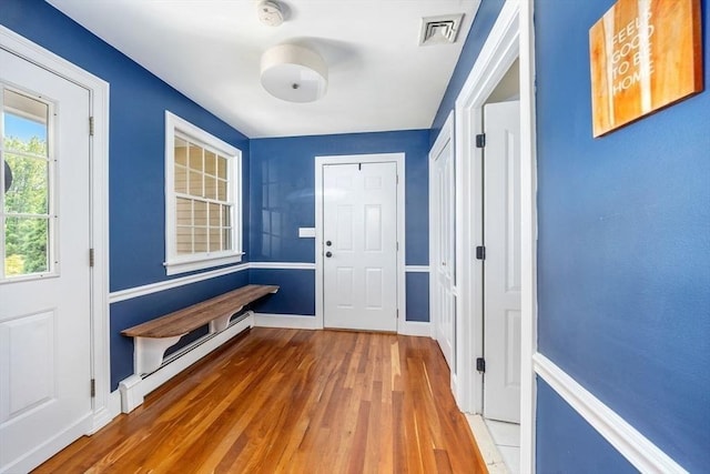 17 Maplewood Dr, Hanover, MA 02339 - mudroom featuring hardwood / wood-style flooring and a baseboard heating unit