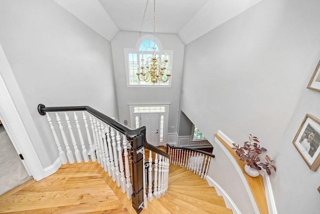 17 Maplewood Dr, Hanover, MA 02339 - stairs with wood finished floors, a chandelier, and high vaulted ceiling