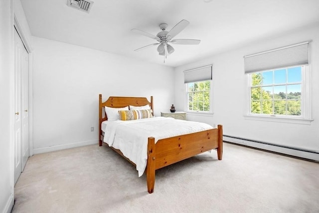 17 Maplewood Dr, Hanover, MA 02339 - bedroom featuring a baseboard radiator, light colored carpet, and ceiling fan