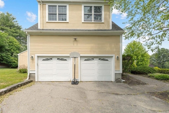17 Maplewood Dr, Hanover, MA 02339 - garage featuring asphalt driveway
