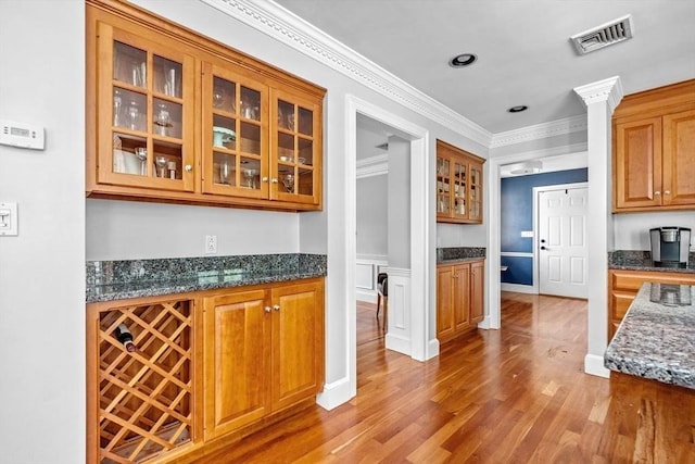 17 Maplewood Dr, Hanover, MA 02339 - bar featuring wood finished floors and ornamental molding