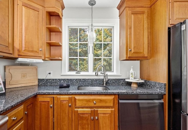 17 Maplewood Dr, Hanover, MA 02339 - kitchen with dishwashing machine, freestanding refrigerator, brown cabinets, and decorative light fixtures