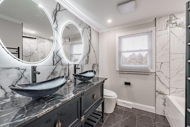 full bathroom with tub / shower combination, toilet, vanity, and crown molding