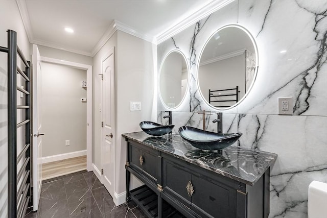 bathroom featuring vanity and crown molding