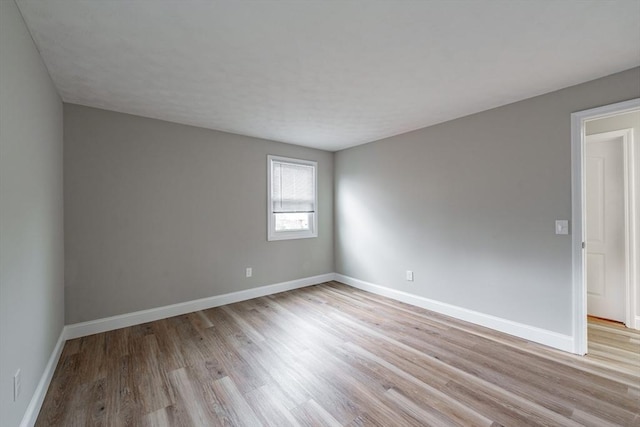 empty room featuring light hardwood / wood-style floors