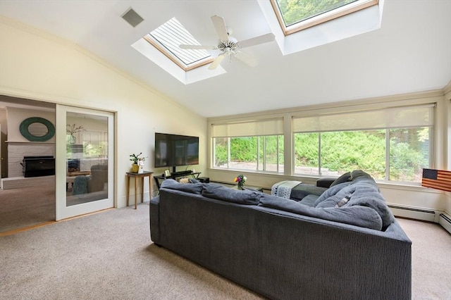 127 E St, East Bridgewater, MA 02333 - carpeted living area with a skylight, a fireplace, and high vaulted ceiling