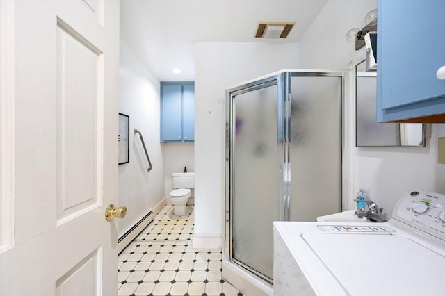 127 E St, East Bridgewater, MA 02333 - bathroom with washer / dryer, a baseboard radiator, a stall shower, toilet, and baseboards