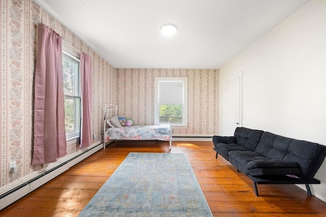 127 E St, East Bridgewater, MA 02333 - bedroom with wallpapered walls, baseboard heating, wood-type flooring, and multiple windows