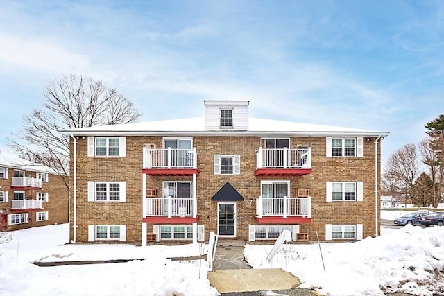 view of snow covered property