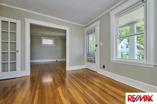 150 Nonantum St, Boston, MA 02135 - entryway with crown molding, hardwood / wood-style flooring, baseboards, and plenty of natural light