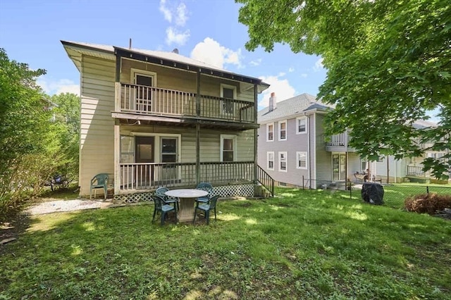 150 Nonantum St, Boston, MA 02135 - rear view of house with a balcony