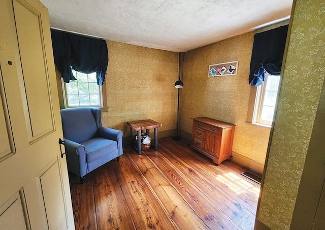 164 Worcester Rd, Westminster, MA 01473 - living area featuring light wood finished floors and wallpapered walls