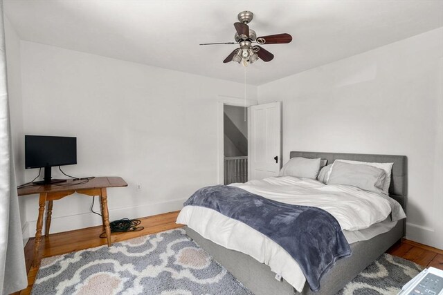 381 Hunnewell St Unit 381, Needham, MA 02494 - bedroom featuring wood finished floors, baseboards, and a ceiling fan